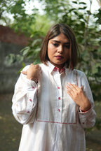BAHAAR OFF-WHITE AND BEIGE SHIRT KURTA AND CHECKERED PANTS