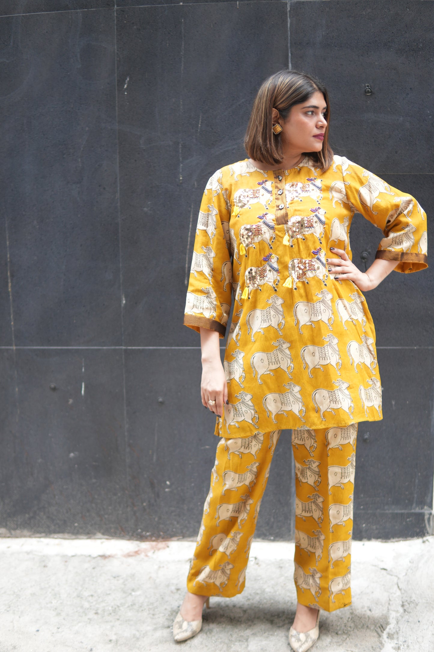 NANDI MUSTARD KALAMKARI SHORT LENGTH KURTA AND PANTS
