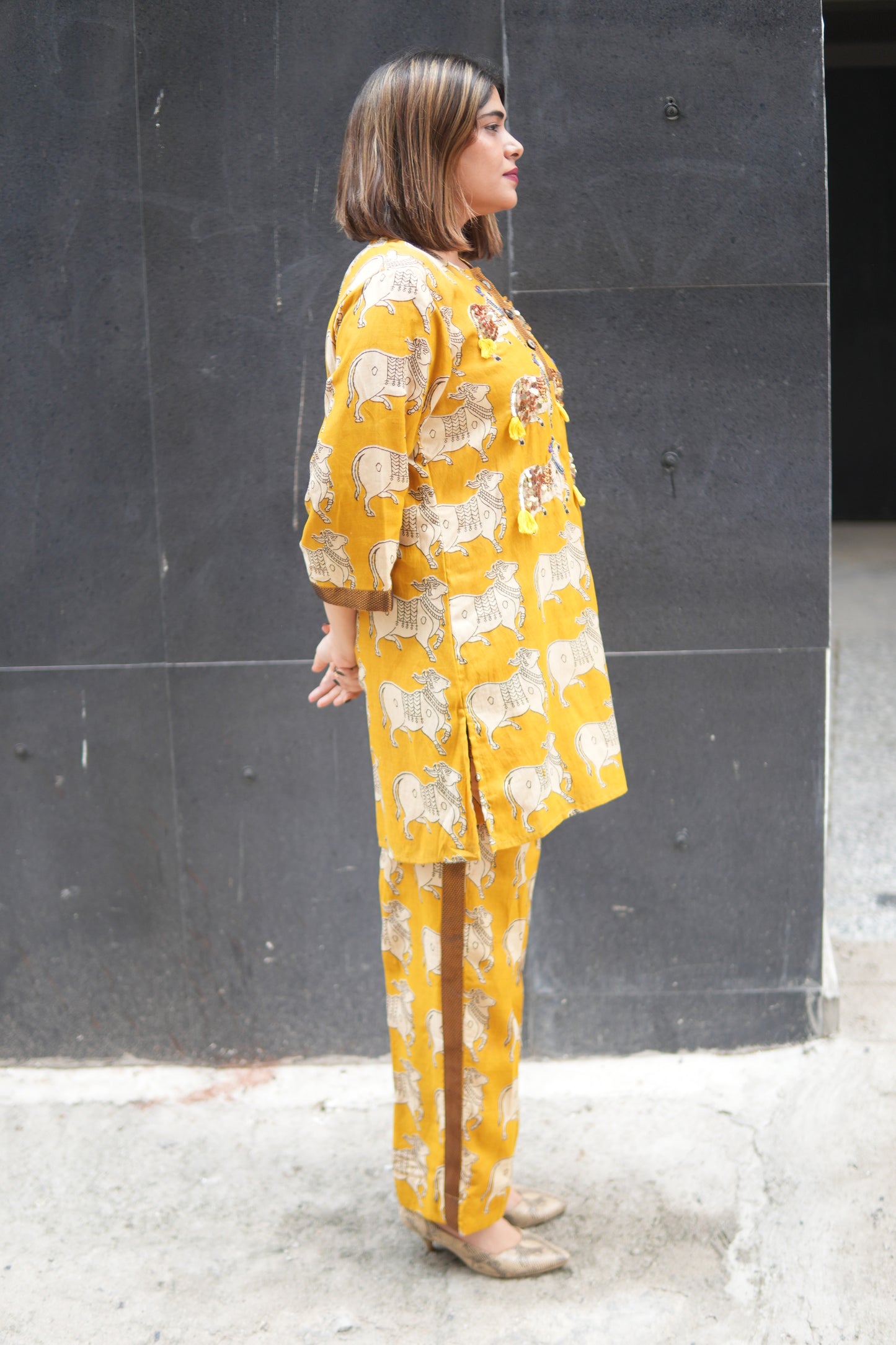 NANDI MUSTARD KALAMKARI SHORT LENGTH KURTA AND PANTS